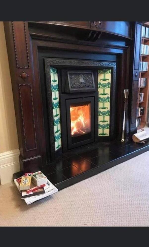 Inset stove in Victorian mahogany surround